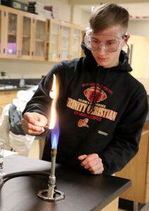 Student lighting Bunson burner